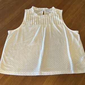 Cream sleeveless top